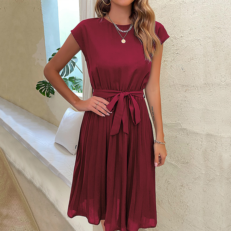 Radiance - Dress with boot neck and pleated skirt