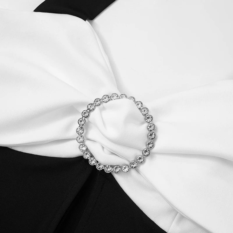 Zara - Monochrome jumpsuit with halterneck and bow accent