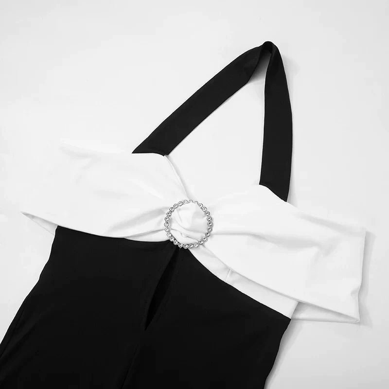 Zara - Monochrome jumpsuit with halterneck and bow accent