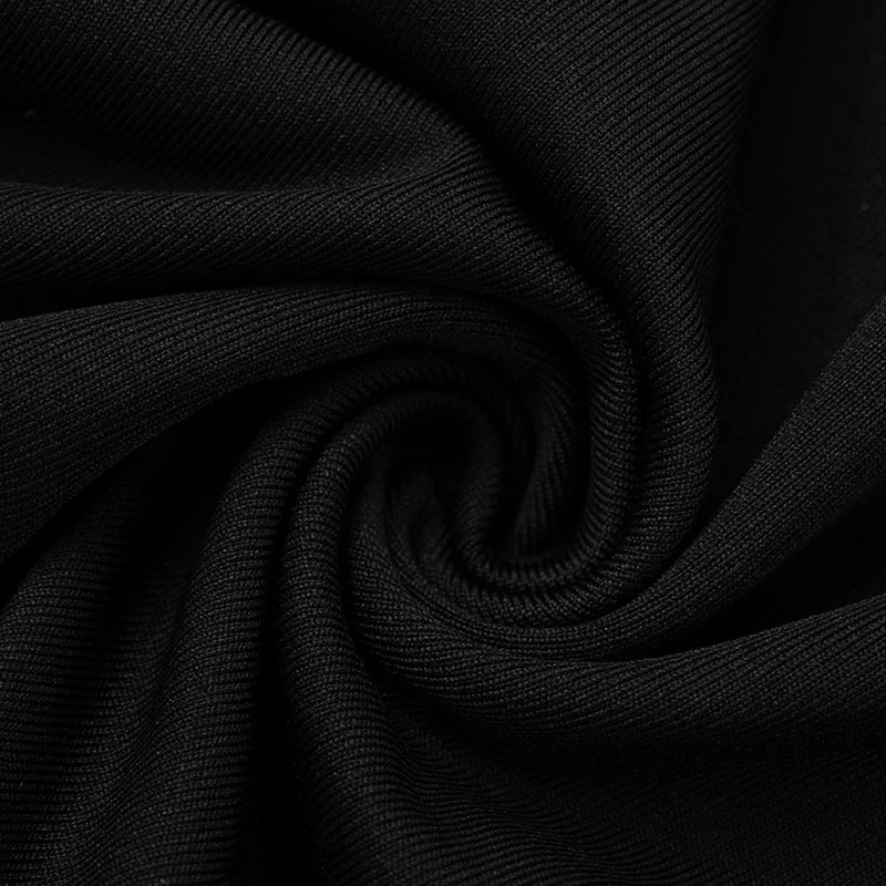 Zara - Monochrome jumpsuit with halterneck and bow accent