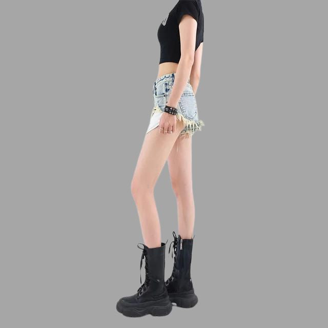 Luna - Distressed denim shorts with fringe detailing