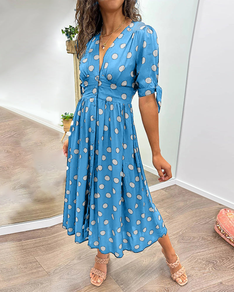 Idalia - Dress with deep V-neckline and polka dots