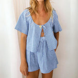 Harper - Gingham romper with keyhole neckline and bow detail