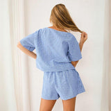 Harper - Gingham romper with keyhole neckline and bow detail