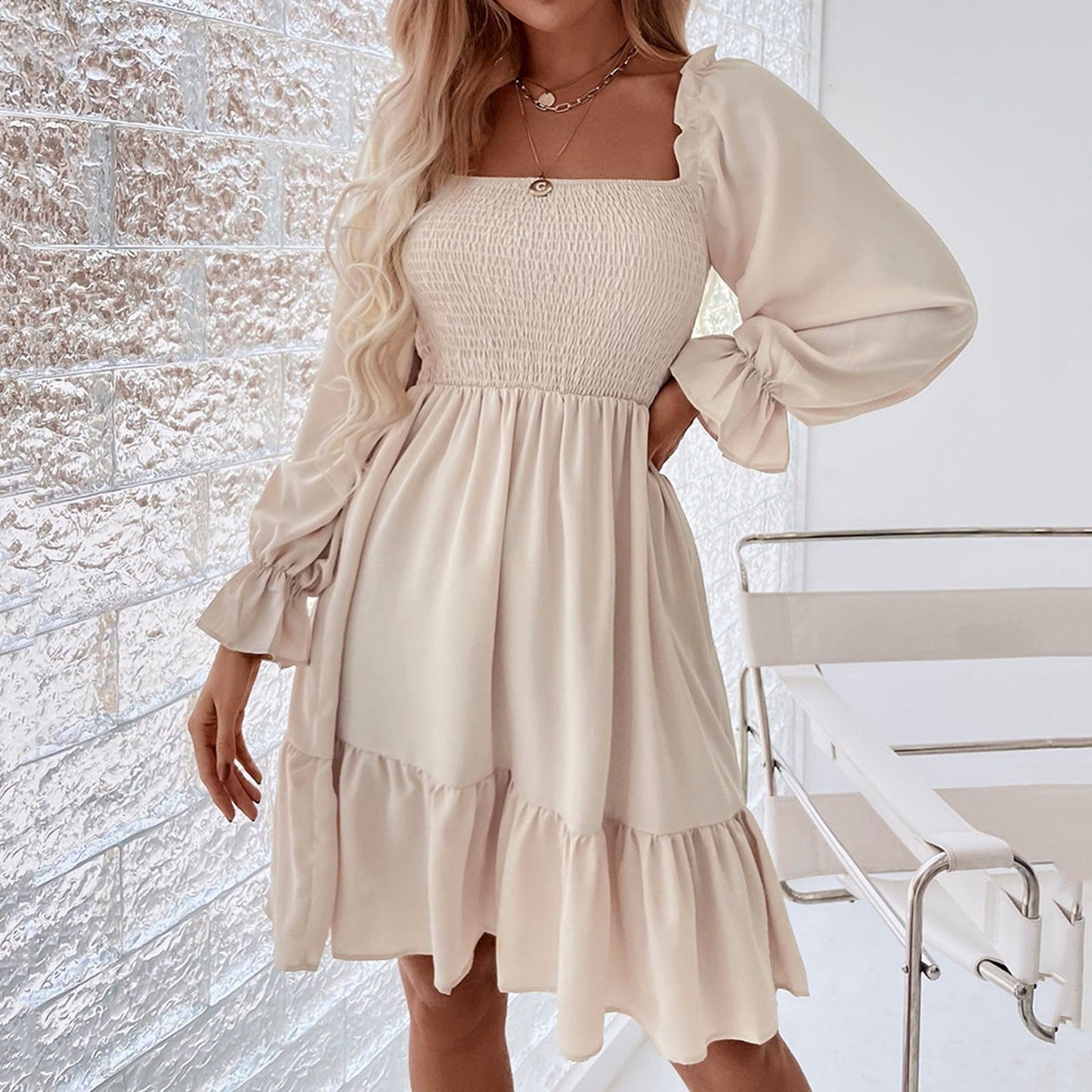 Camila Dress - Radiate feminine elegance in this ruffled mini dress