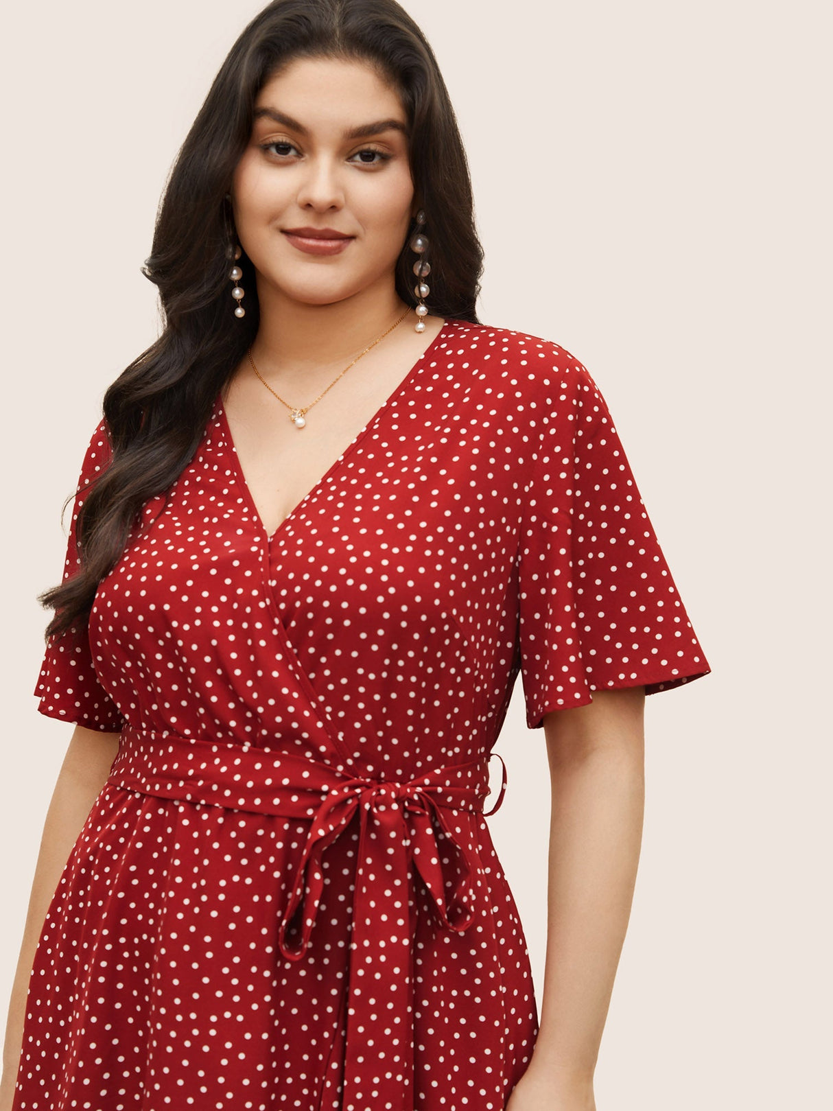 Polka Dot Surplice Neck Belted Arc Hem Dress