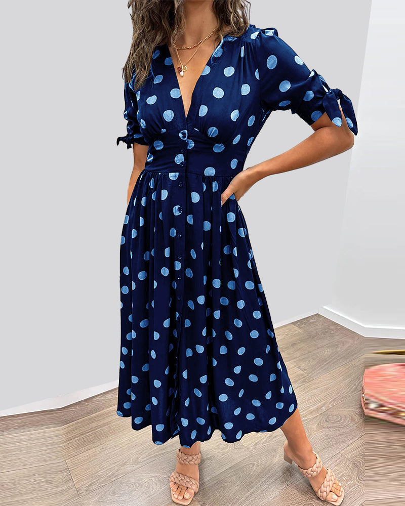 Idalia - Dress with deep V-neckline and polka dots