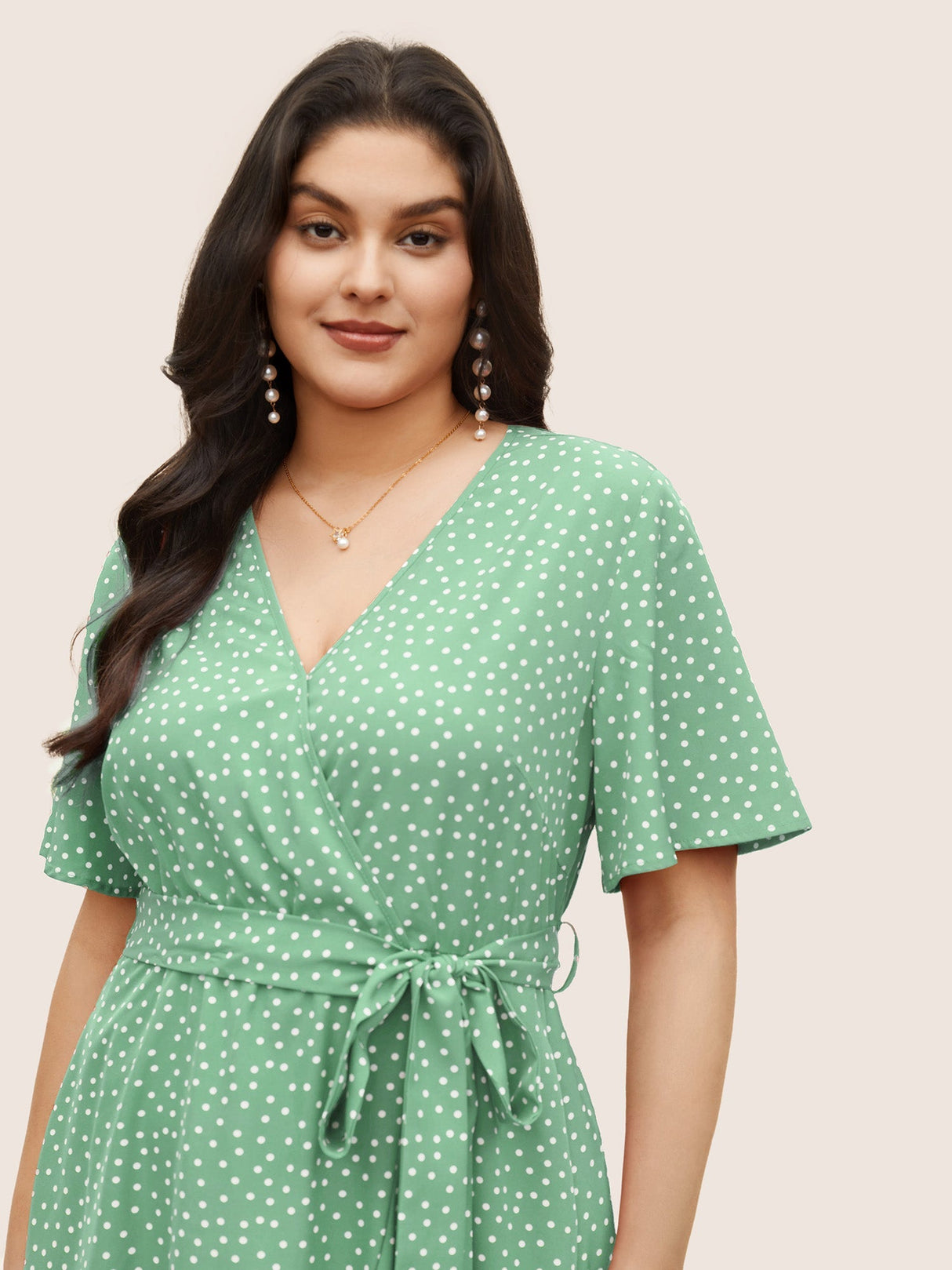 Polka Dot Surplice Neck Belted Arc Hem Dress