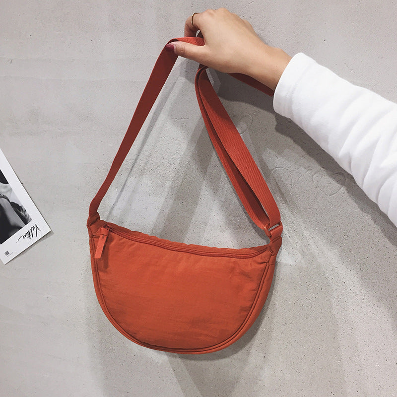 Crescent-shaped bag