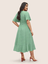 Polka Dot Surplice Neck Belted Arc Hem Dress