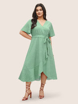 Polka Dot Surplice Neck Belted Arc Hem Dress