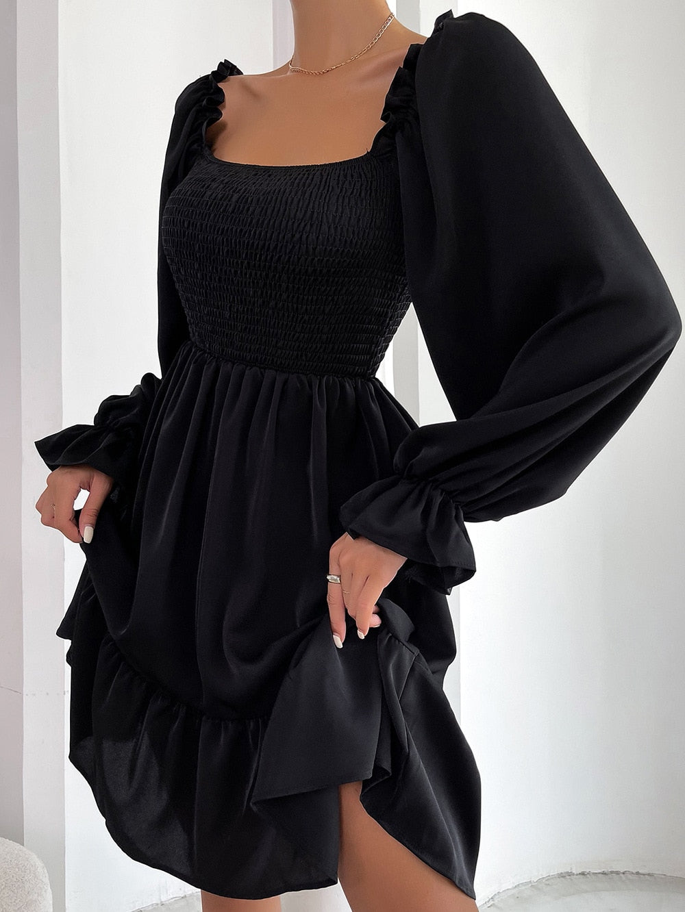 Camila Dress - Radiate feminine elegance in this ruffled mini dress