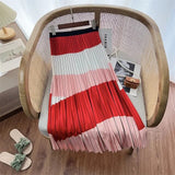 Fashionable pleated skirt with colourful print