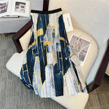 Fashionable pleated skirt with colourful print