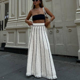 Women's striped knitted skirt with tassels