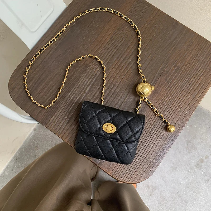 Chloe - Quilted mini shoulder bag with chain strap