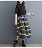 Women's skirt with letter print and asymmetric hem