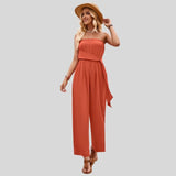Olivia - Off-the-shoulder jumpsuit with waist tie