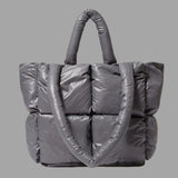 Aurora - Metallic puffer carrier bag with ruffled design