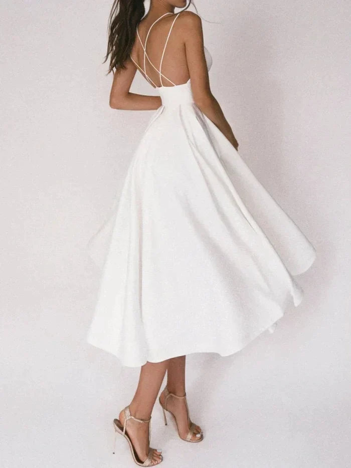 Audrey elegant dress with V-neckline and straps