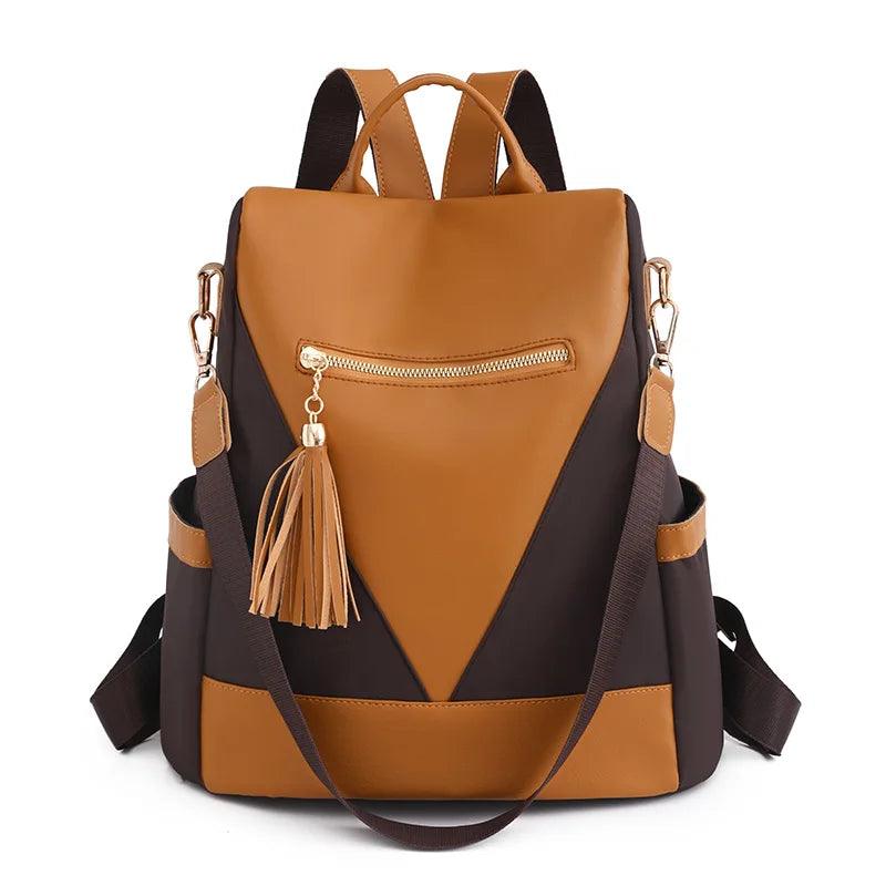 Valencia - Backpack in two-colour look with tassel pendant