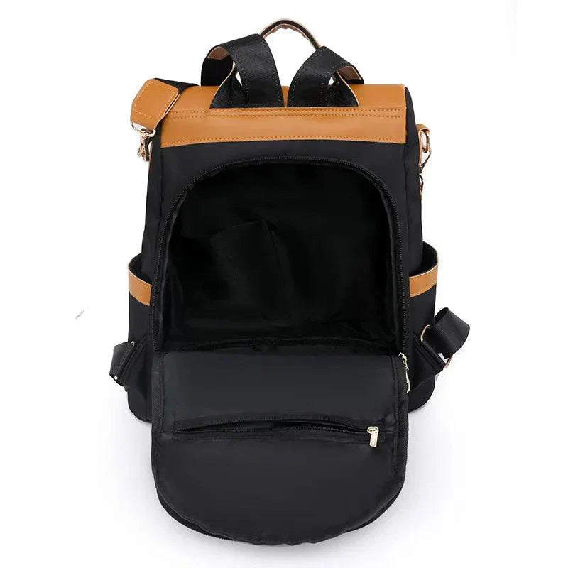 Valencia - Backpack in two-colour look with tassel pendant