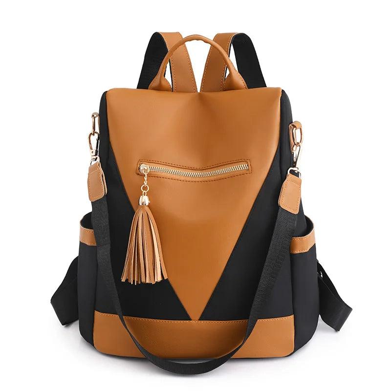 Valencia - Backpack in two-colour look with tassel pendant